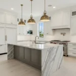 Luxury kitchen remodel with custom cabinetry and marble island in a Palm Beach FL home
